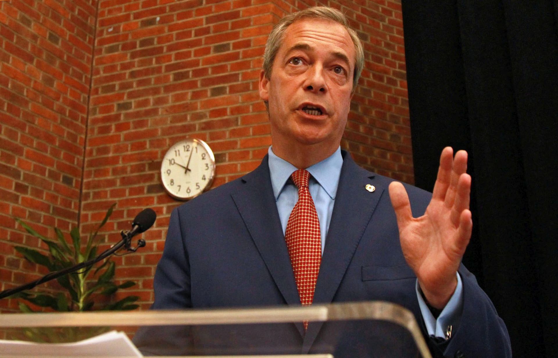 epa05406814 UK Independence Party (UKIP) leader Nigel Farage delivers a speech on UKIP's plans for the coming months, at the Emmanuel center in Westminster, London, Britain, 04 July 2016. During the speech, Farage announced he is resigning as UKIP leader.  EPA/SEAN DEMPSEY