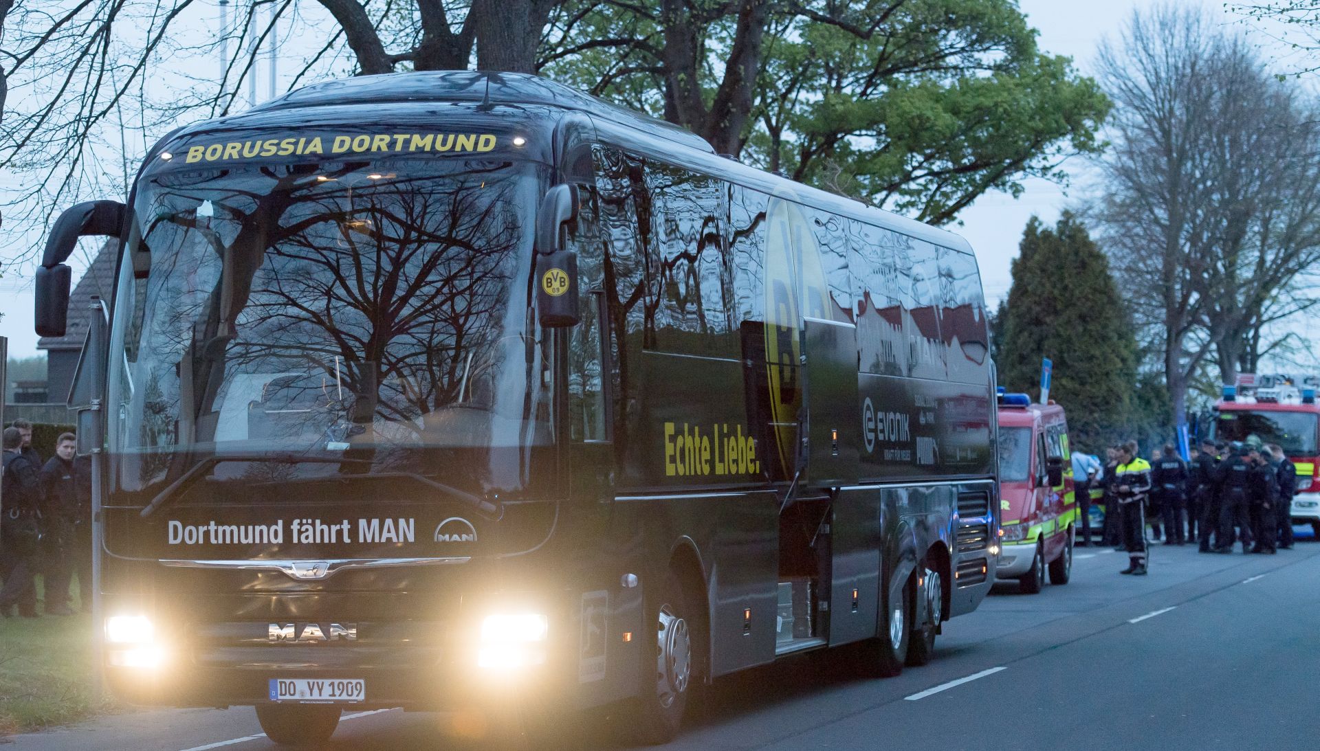 epa05903400 A view on the damaged Borussia Dortmund's team bus after it was hit by three explosions in Dortmund, Germany, 11 April 2017. According to reports, Borussia Dortmund's team bus was damaged by three explosions on 11 April, as it was on its way to the stadium ahead of the UEFA Champions League soccer match between Borussia Dortmund and AS Monaco. Borussia Dortmund's player Marc Bartra was injured and is hospitalized. The match has been postponed.  EPA/STR