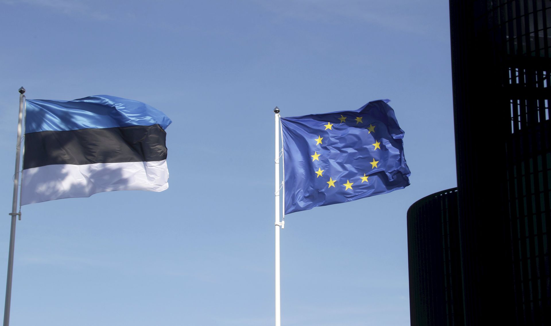 epa06056669 Estonian and European Union flags are seen during the opening event of the Estonian Presidency of the Council of the European Union at the Tallinn Creative Hub (Kultuurikatel) in Tallinn, Estonia 29 June 2017. Estonia holds the presidency of the Council of the European Union for the first time from July to December 2017.  EPA/VALDA KALNINA