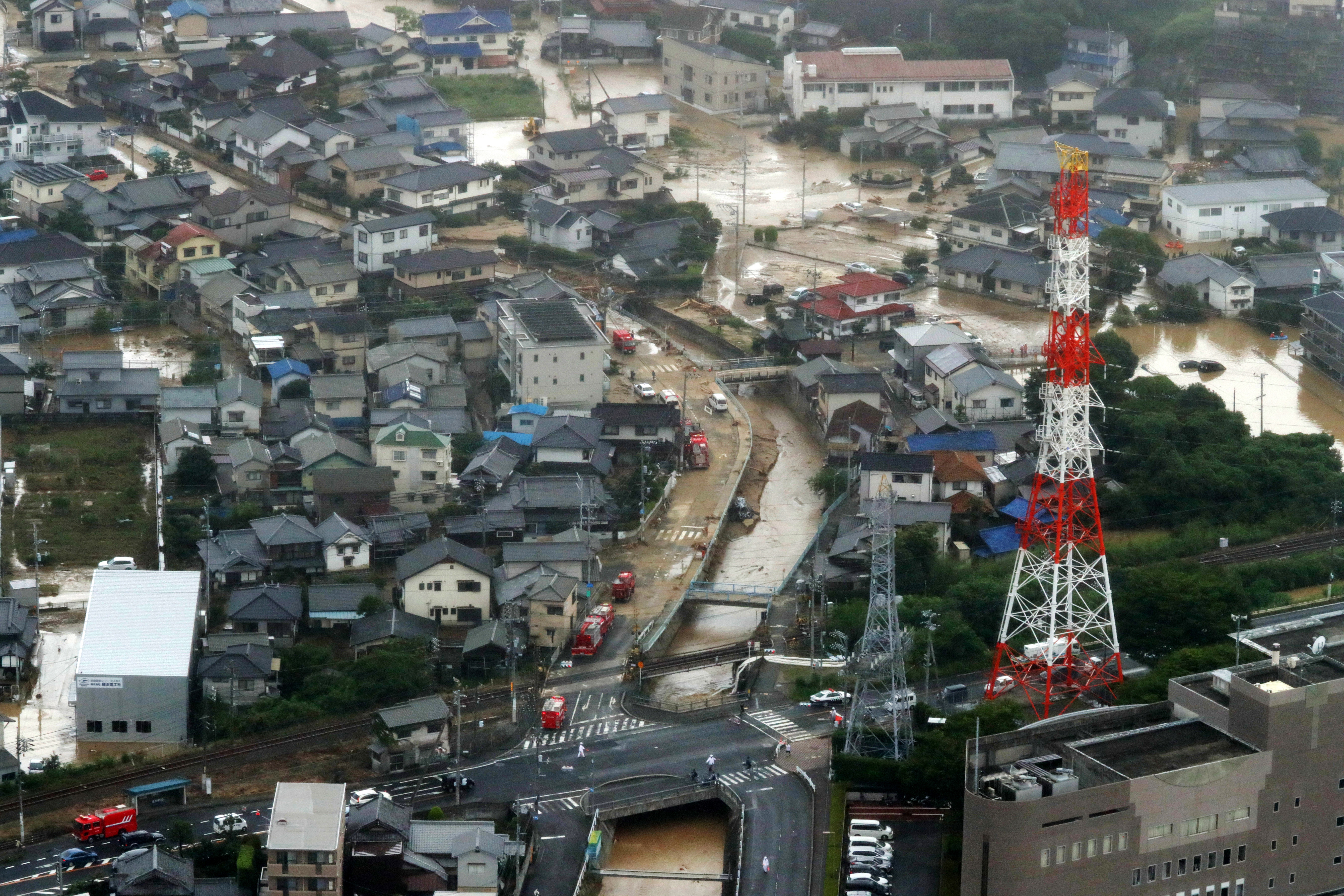 epa06870477 Floods by heavy rain destroy houses and flow road in Saka town, Hiroshima Prefecture, western Japan, 07 July 2018. Heavy rainfall killed 47 people and missing more than 47 people in southwestern and western Japan, public television reported on 07 July 2018. Japan Meteorological Agency has warned record rainfall on 06 July for flooding, mudslides in southwestern and western Japan through 08 July and issued emergency weather warnings to six prefectures. In nine prefectures in western and southwestern Japan,  authorities issued evacuation orders to more than one million of people in southwestern and western Japan.  EPA/JIJI PRESS EDITORIAL USE ONLY/NO ARCHIVE/JAPAN OUT  NO ARCHIVES