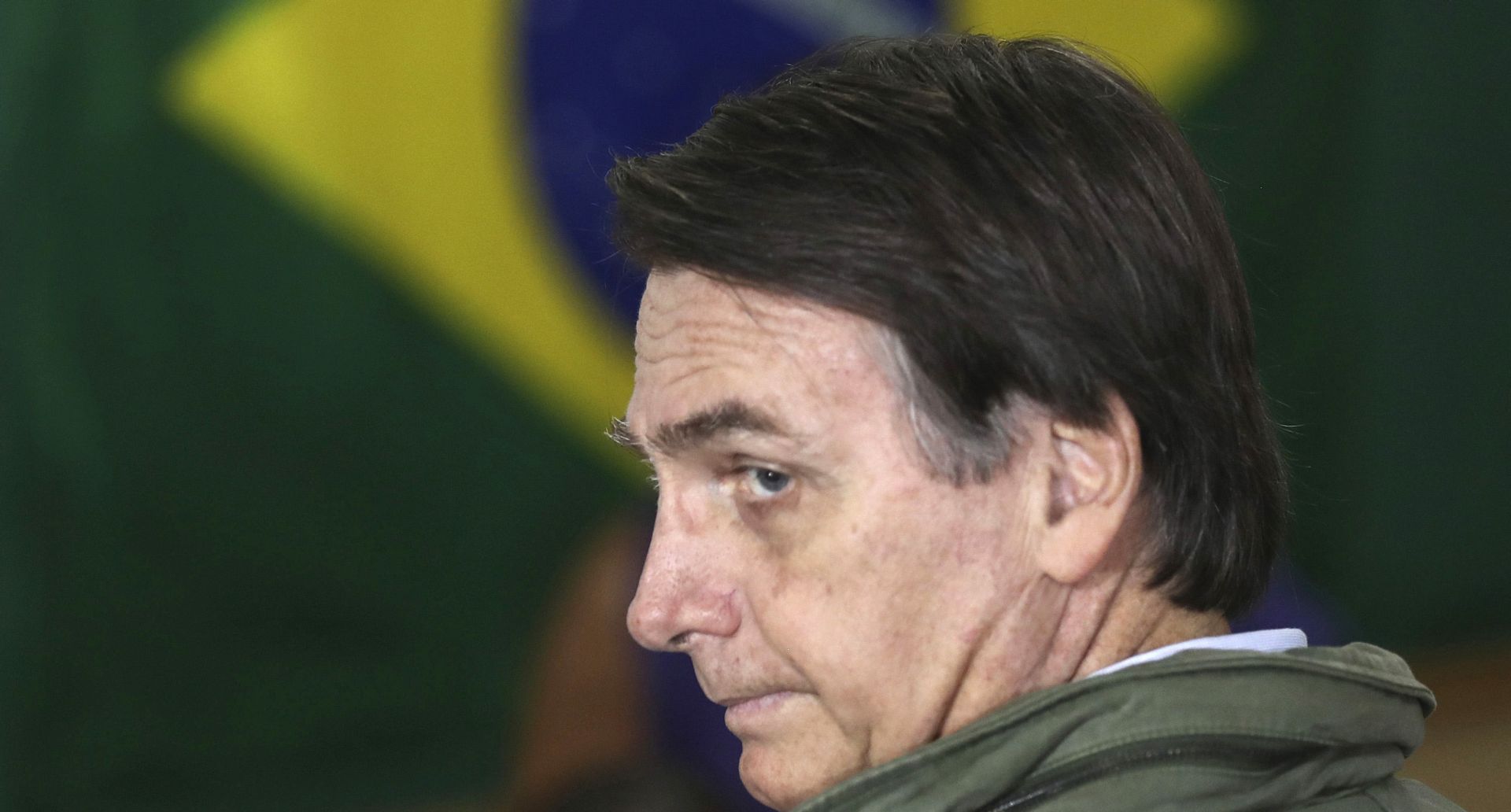 epa07126564 Far-right candidate of the Social Liberal Party (PSL) Jair Bolsonaro (R) votes at a polling station in Rio de Janeiro, Brazil, 28 October 2018. Brazilians are called to vote in the second round of the country's presidential elections, where far-right candidate Jair Bolsonaro is favorite to win in all surveys. Fernando Haddad of the Workers Party will face Jair Bolsonaro, of the Social Liberal Party (PSL) in the second round of voting.  EPA/RICARDO MORAES / POOL