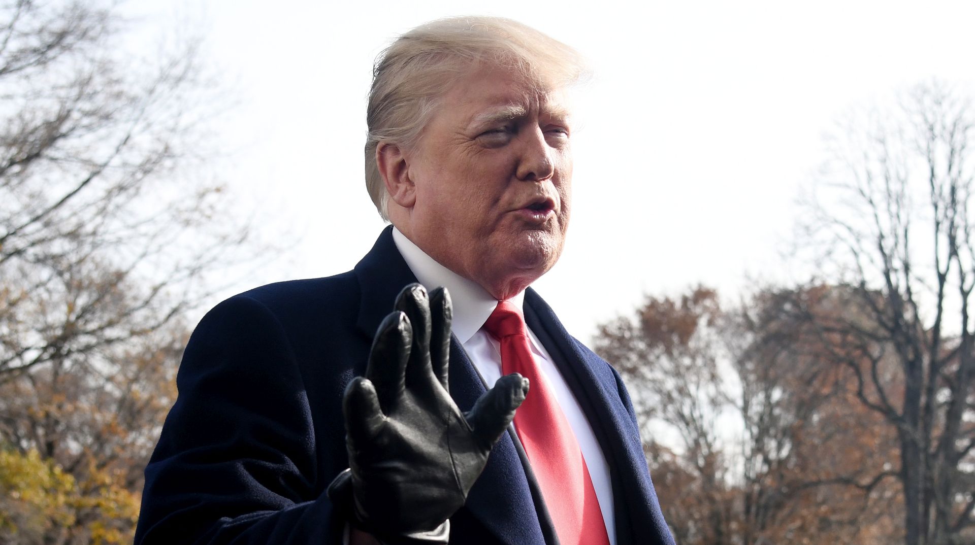 epa07218039 US President Donald J. Trump answers questions from the press while departing the White House in Washington, DC, USA, 08 December 2018. Trump said White House chief of staff John Kelly will resign by the end of the year, before departing for the 119th Army-Navy Football Game in Philadelphia, PA.  EPA/Olivier Douliery / POOL