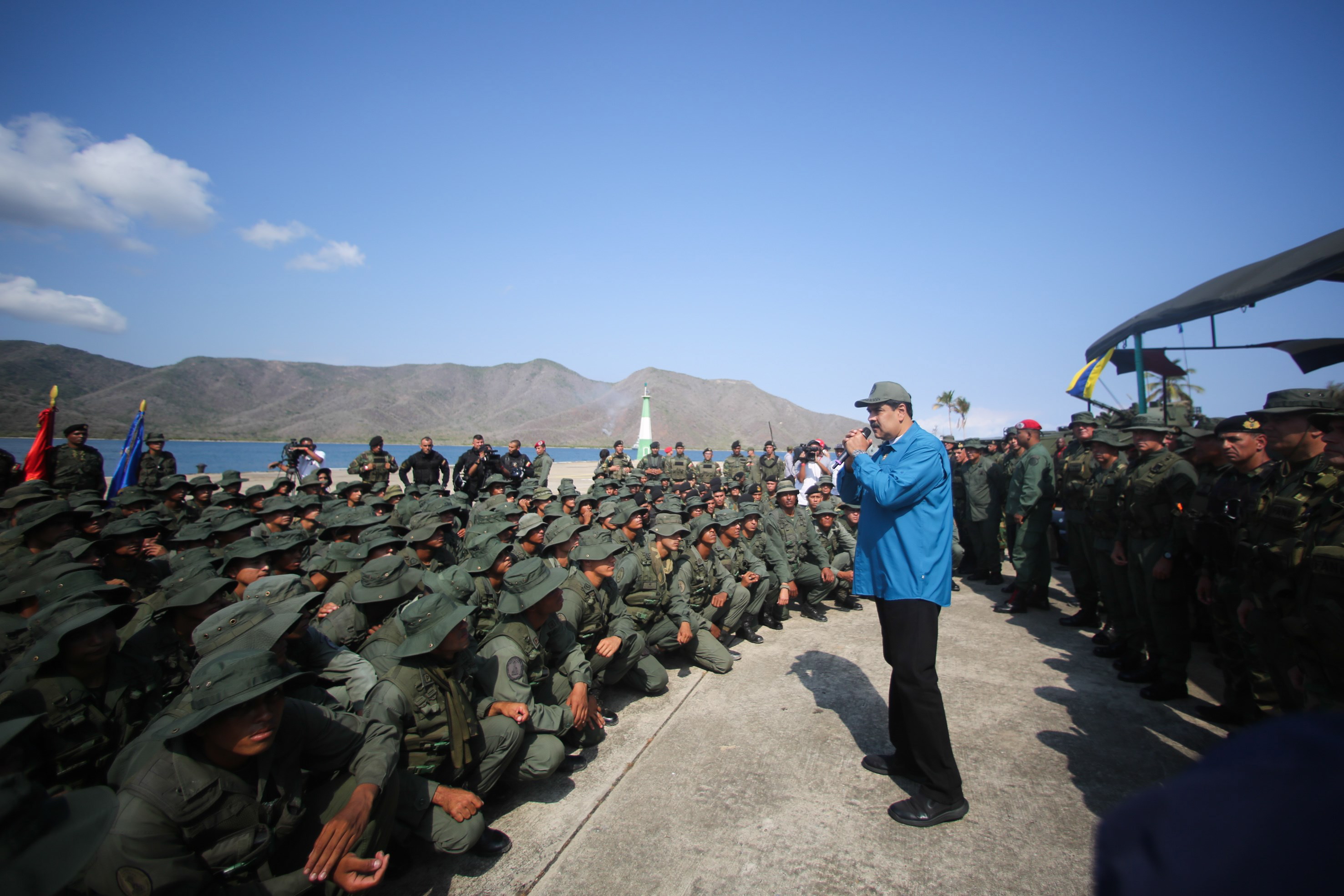 epa07341099 A handout picture provided by the Miraflores press office that shows Venezuelan President Nicolas Maduro (C) during an event with members of the military, in Turiamo, Venezuela, 03 February 2019, where he asked the troops to take care of the 'union' and 'loyalty' to the National Amerd Forces.  EPA/PRENSA MIRAFLORES HANDOUT  HANDOUT EDITORIAL USE ONLY/NO SALES