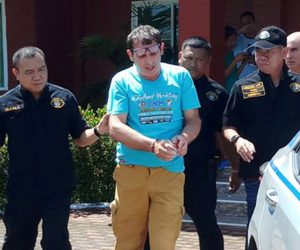 epa07653427 A handout photo made available by the Crime Suppression Division of the Royal Thai Police shows Thai police officers arresting Italian fraudster crime suspected Francesco Galdelli (C) at a house on the outskirts of Pattaya resort city, Chonburi province, Thailand, 15 June 2019 (issued 17 June 2019). Thai police arrested an Italian couple, a man identified as Francesco Galdelli and a woman Vanja Goffi as they wanted on an interpol notice after fleeing a jail sentence in Italy, accused of fraudulently using the name of US Hollywood actor George Clooney to scam people to invest in a bogus clothing company.  EPA/CRIME SUPPRESSION DIVISION/ROYAL THAI POLICE HANDOUT -- BEST QUALITY AVAILABLE -- HANDOUT EDITORIAL USE ONLY/NO SALES