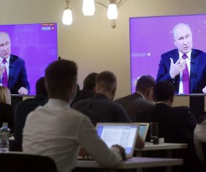 epa07659927 Russian journalists watch Russian President Vladimir Putin during his annual Question and Answer live-broadcast nationwide television and radio session 'Direct Line with Vladimir Putin' at the Gostiny Dvor studio in Moscow, Russia, 20 June 2019. During the broadcast President Vladimir Putin directly answers questions from Russia's citizens.  EPA/SERGEI CHIRIKOV