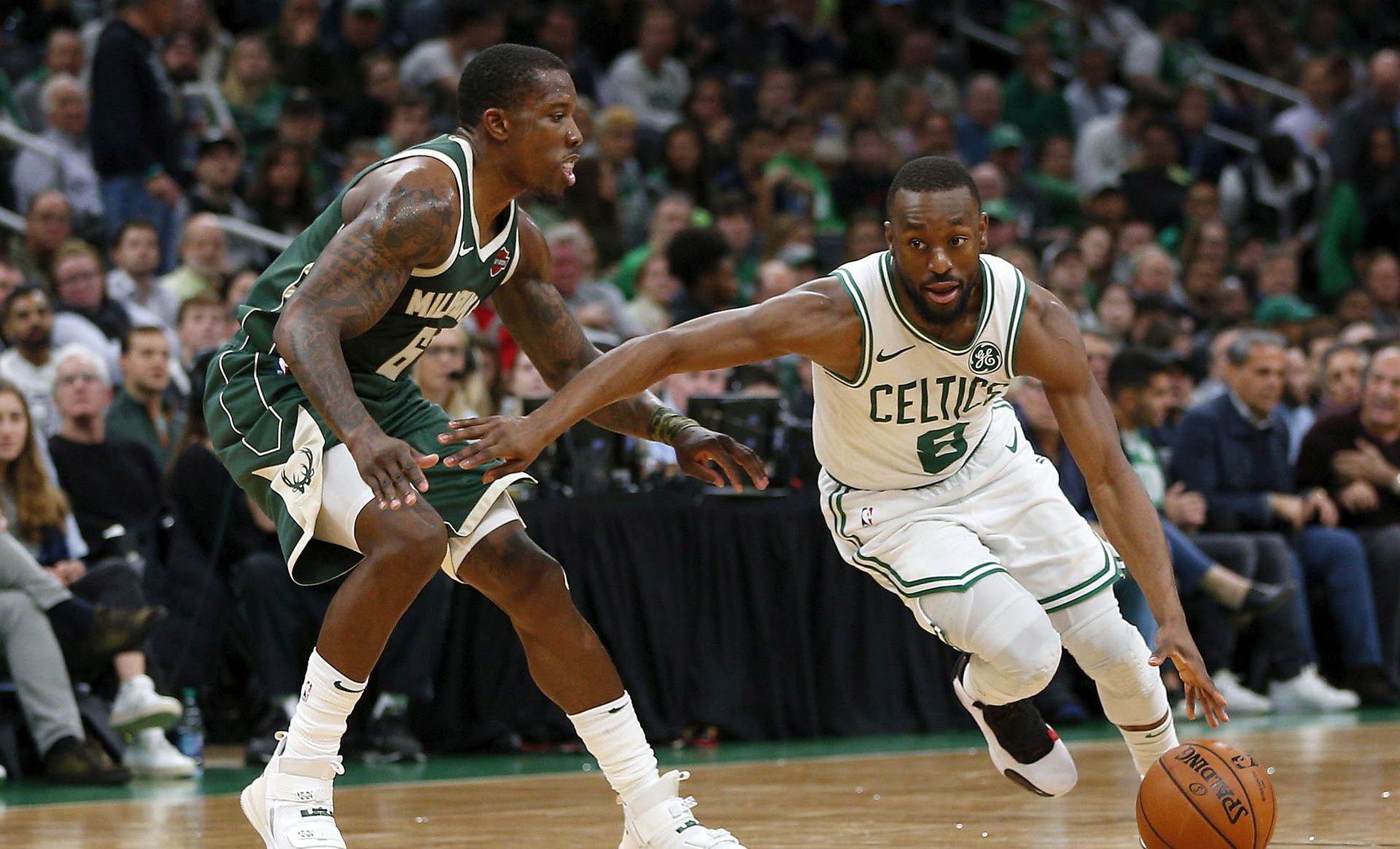 epa07961351 Boston Celtics guard Kemba Walker (R) gets past defending Milwaukee Bucks guard Eric Bledsoe (L) during the second quarter at the TD Garden in Boston, Massachusetts, USA 30 October 2019.  EPA/CJ GUNTHER SHUTTERSTOCK OUT