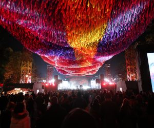 epa07984567 Visitors attend the celebrations of the 30th anniversary of the fall of the Berlin Wall at the Brandenburg Gate in Berlin, Germany, 09 November 2019. The fall of the Berlin Wall led to the collapse of the communist East German GDR government in 1989 and the eventual reunification of East and West Germany.  EPA/FRIEDEMANN VOGEL