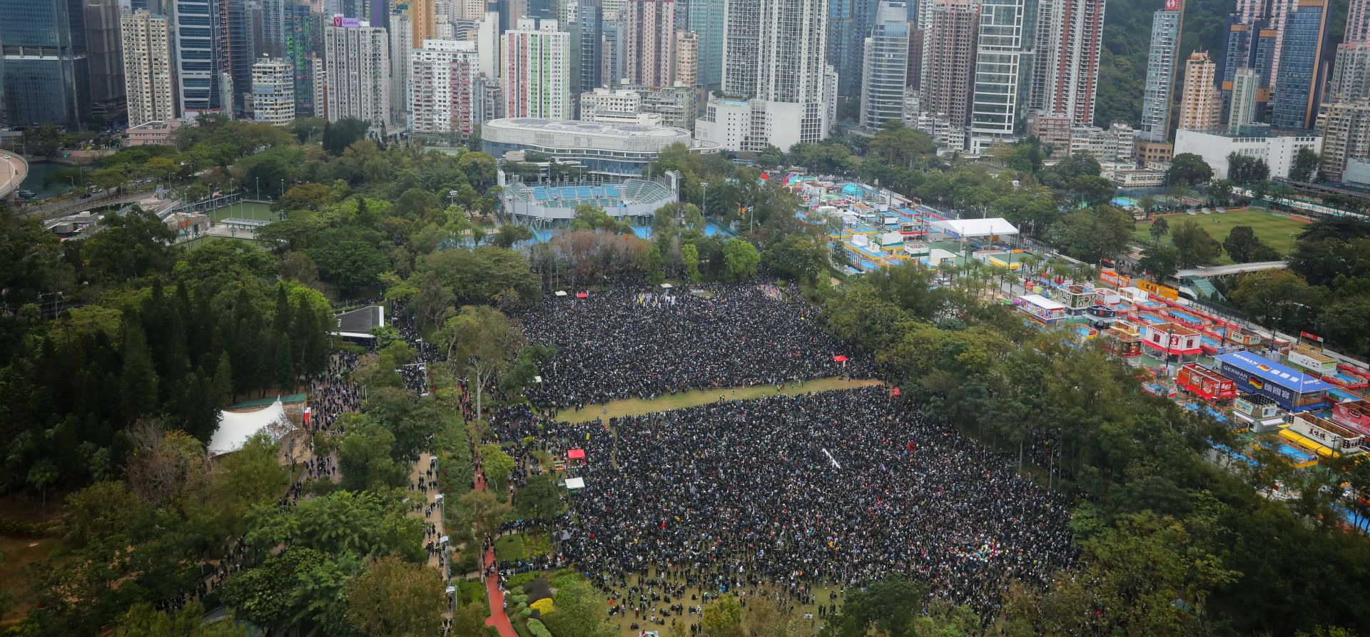 epa08097131 An aerial view shows protesters gathering for an anti-government rally on New Year's Day in Hong Kong, China, 01 January 2020. Hong Kong has entered its seventh month of mass protests, originally triggered by a now withdrawn extradition bill, that have since turned into a wider pro-democracy movement.  EPA/VIVEK PRAKASH