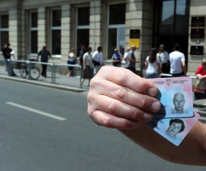 03.06.2013., Zagreb - Izoblicena lica na novim osobnim iskaznicama iznenadila su nekolicinu gradjana grada Zagreba. Nakon sto su u Petrinjskoj ulici u policijskj upravi predali zahtjev i podigli nove osobne iskaznice, bracni par iz Zagreba ostao je sokiran kada su pogledali fotografije na iskaznici. Lica svakoga od njih su izduzena, odnosno spljostena u usporedbi sa originalnom fotografijom. 
Photo: Sanjin Strukic/PIXSELL