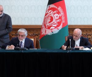 epa08428018 A handout photo made available by the Afghan President's office shows Afghanistan's President Ashraf Ghani (seated, R) and Abdullah Abdullah (seated, L), the second most voted in the September 2019's elections, signing an agreement during a meeting in Kabul, Afghanistan, 17 May 2020. President Ghazni and Abdullah Abdullah reached an agreement to end months of stalemate over the outcome of the vote. According to the agreemet Dr. Abdullah will lead the National Reconciliation High Council and members of his team will be included in the cabinet.  EPA/PRESIDENTIAL PALACE / HANDOUT HANDOUT  HANDOUT EDITORIAL USE ONLY/NO SALES