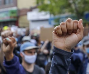 epa08459205 People participate in a protest over the Minneapolis, Minnesota arrest of George Floyd, who later died in police custody, in Brooklyn, New York, USA, 01 June 2020.  A bystander's video posted online on 25 May, appeared to show George Floyd, 46, pleading with arresting officers that he couldn't breathe as an officer knelt on his neck. The unarmed Black man later died in police custody. According to news reports on 29 May, Derek Chauvin, the police officer in the center of the incident has been taken into costody and charged with murder in the George Floyd killing.  EPA/JUSTIN LANE