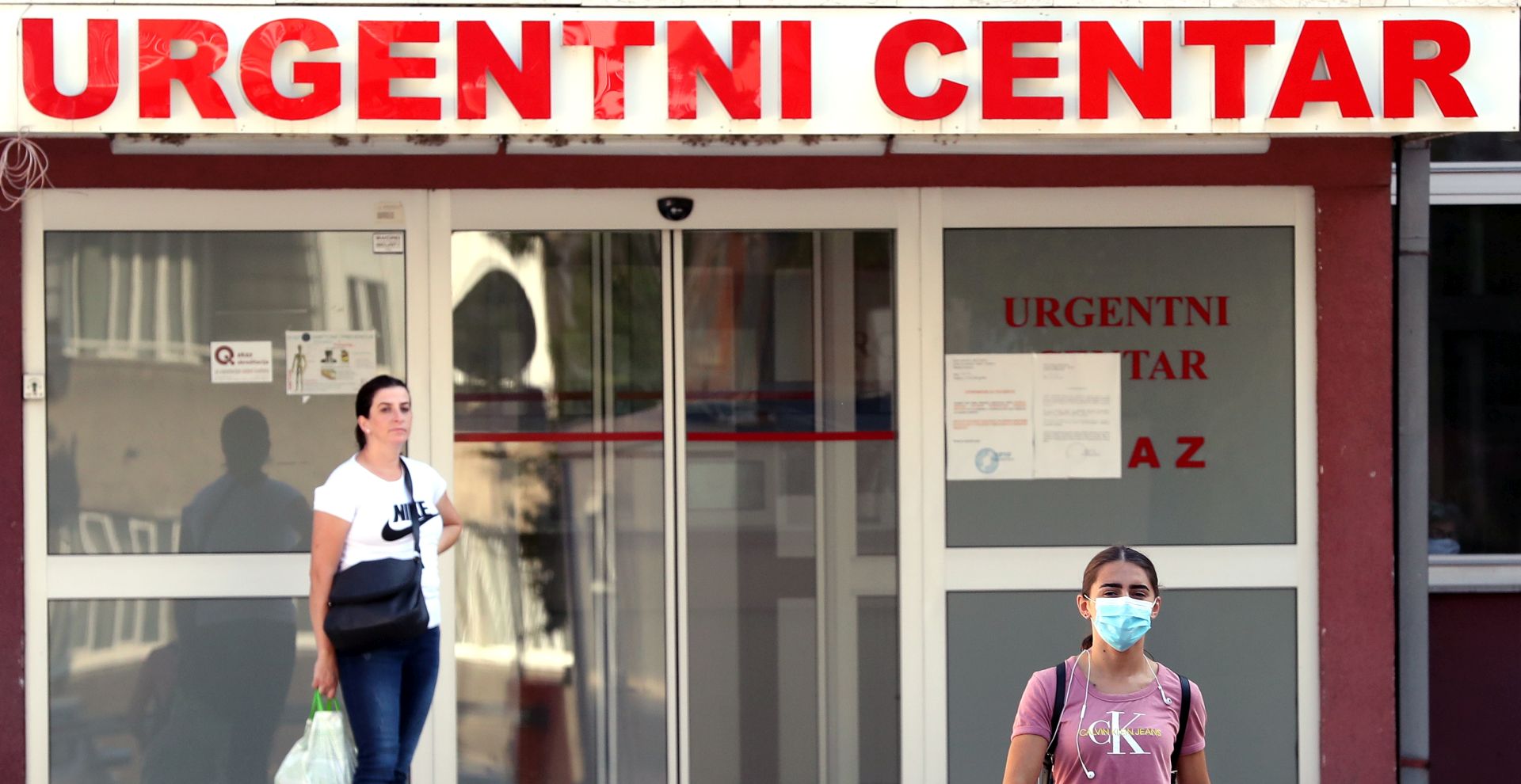 epa08562234 People arrive at the hospital to be tested for coronavirus in Sarajevo, Bosnia and Herzegovina, 23 July 2020. Countries around the world are taking increased measures to stem the widespread of the SARS-CoV-2 coronavirus which causes the Covid-19 disease.  EPA/FEHIM DEMIR