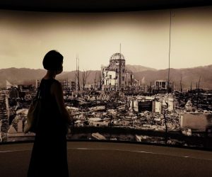 epa08584665 A visitor looks at photographs of the Hiroshima bombing aftermath, at the Hiroshima Peace Memorial Museum in Hiroshima, Japan, 05 August 2020. On 06 August 2020 Japan will mark the 75th anniversary of the bombing of Hiroshima. In 1945 the United States dropped two nuclear bombs over the cities of Hiroshima and Nagasaki on 06 and 09 August respectively, killing more than 200,000 people. This year’s annual commemoration events were either canceled or scaled down amid the ongoing coronavirus pandemic.  EPA/DAI KUROKAWA