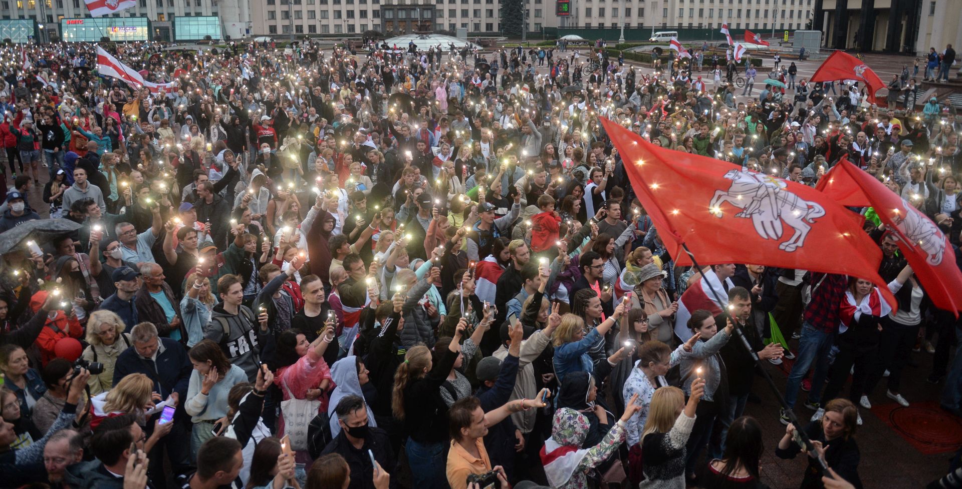 epa08613171 People attend a rally in support of the Belarusian Opposition to demonstrate against police brutality and the presidential election results in Minsk, Belarus, 19 August 2020. The Belarusian opposition has called for a general strike from 17 August, a day after tens of thousands of demonstrators gathered in the capital Minsk in peaceful protest. Long-time president Lukashenko, in a defiant speech on 16 August, rejected calls to step down amid mounting pressure after unrest erupted in the country over alleged poll-rigging and police violence at protests following election results claiming that he had won a landslide victory in the 09 August elections. Opposition leader Tikhanovskaya fled to Lithuania after rejecting the election result she claimed was rigged.  EPA/YAUHEN YERCHAK