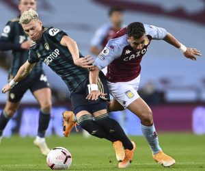 epa08768916 Mahmoud Trezeguet (R) of Aston Villa and Ezgjan Alioski (L) of Leeds United in action during the English Premier League soccer match between Aston Villa and Leeds United in Birmingham, Britain, 23 October 2020.  EPA/Laurence Griffiths / POOL EDITORIAL USE ONLY. No use with unauthorized audio, video, data, fixture lists, club/league logos or 'live' services. Online in-match use limited to 120 images, no video emulation. No use in betting, games or single club/league/player publications.