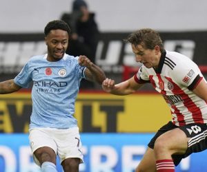 epa08788192 Sander Berge  of Sheffield (R) in action against Raheem Sterling of Manchester City (L) during the English Premier League soccer match between Sheffield United and Manchester City in Sheffield, Britain, 31 October 2020.  EPA/Tim Keeton / POOL EDITORIAL USE ONLY. No use with unauthorized audio, video, data, fixture lists, club/league logos or 'live' services. Online in-match use limited to 120 images, no video emulation. No use in betting, games or single club/league/player publications.