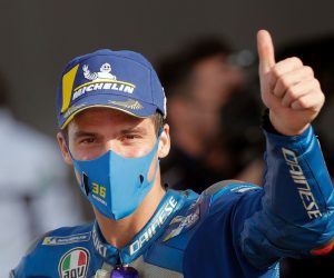 epa08807548 Spanish MotoGP rider Joan Mir, Suzuki Ecstar, celebrates winning the Motorcycling Grand Prix of Europe at Ricardo Tormo circuit in Cheste, eastern Spain, 08 November 2020.  EPA/Kai Foersterling