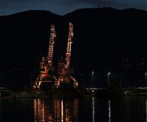 31.10.2020., Rijeka - Stare lucke dizalice, na lukobranu rijecke luke Mololongu, osvijetljene crvenim svjetlom. Photo: Goran Kovacic/PIXSELL