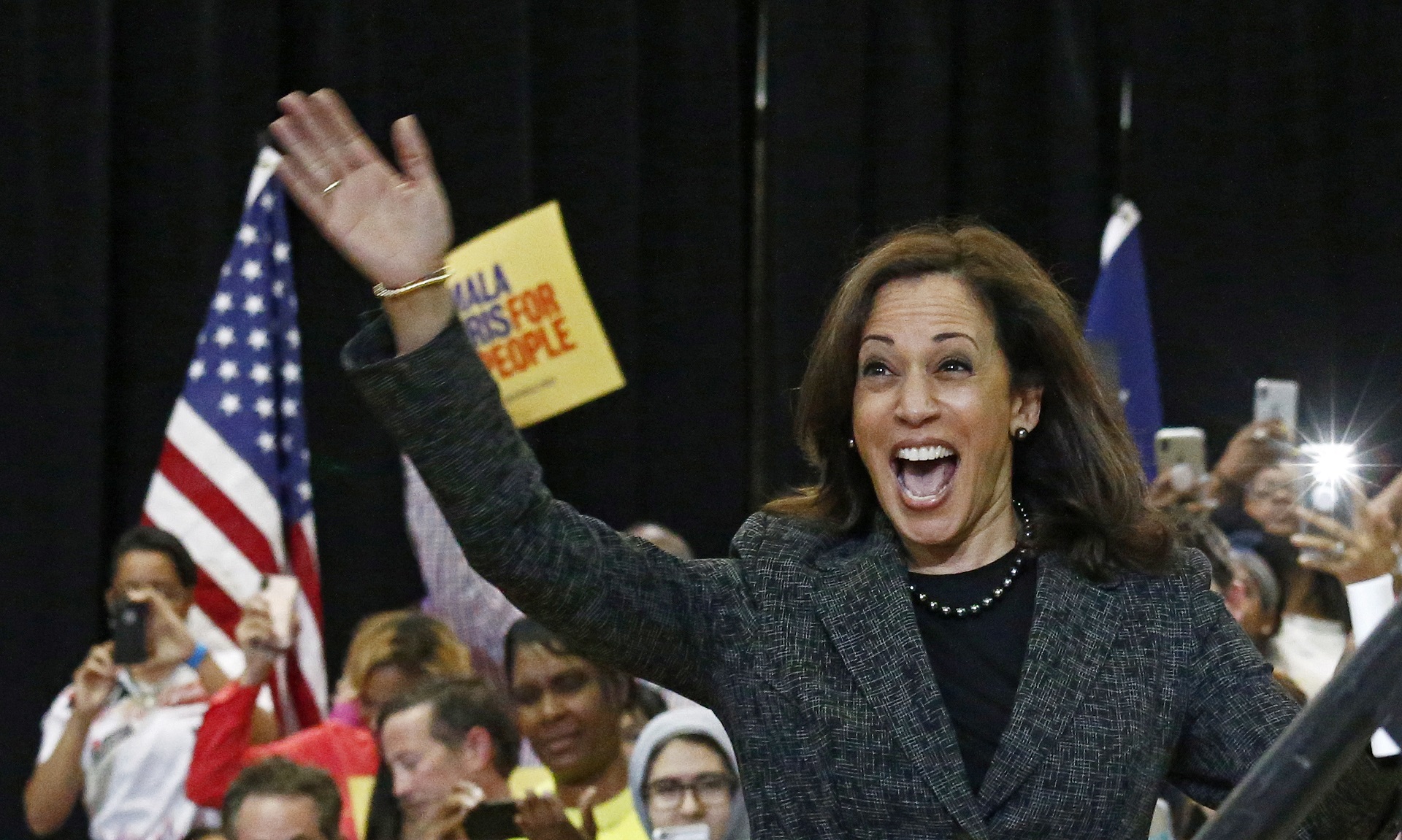 epa08805423 (FILE) - US Senator Kamala Harris waves to the audience during a rally at Texas Southern University Recreational Center in Houston, Texas, USA, 23 March 2019 (reissued 07 November 2020). Kamala Harris could become the first woman of color to be US Vice President. Media report on 07 November 2020 that Democratic candidate Biden has won the Electoral College's majority following the 03 November presidential election.   *** Local Caption *** 55077013  EPA/LARRY W. SMITH *** Local Caption *** 55077013