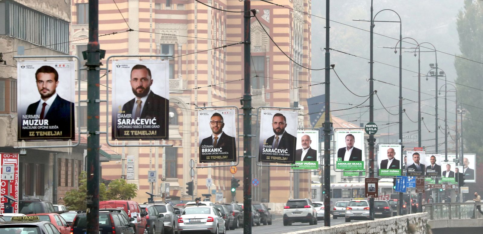 epa08818669 A general view showing various election campaign posters in Sarajevo, Bosnia and Herzegovina, 13 November 2020. More than three million Bosnian citizens are eligible to vote in the country's Local elections on 15 November 2020.  EPA/FEHIM DEMIR