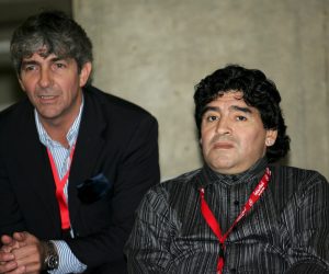 epa08873619 (FILE) - Former Argentinian soccer star Diego Maradona (R) and former Italian striker Paolo Rossi (L) watch a training session of AC Milan at Ataturk Olympic Stadium in Istanbul, Tuesday 24 May 2005 (reissued 10 December 2020). According to news reports, Paolo Rossi died aged 64 on 09 December 2020. As part of FIFA's 100th anniversary, in 2004 Rossi was named as one of the Top 125 greatest living footballers.  EPA/DANIEL DAL ZENNARO