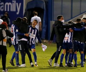 epa08954483 Alcoyano players celebrate their victory against Real Madrid at the end of the Spain's King Cup round of 32 match between Alcoyano and Real Madrid at El Collao stadium in Alcoy, Alicante, eastern Spain, 20 January 2021.  EPA/Manuel Lorenzo