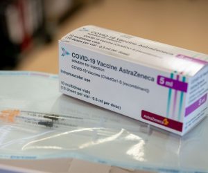 epa09000842 Syringes and a package with the COVID-19 vaccine from AstraZeneca are displayed at the fourth vaccination centre in Berlin at Tegel Airport, Germany, 10 February 2021. At the beginning, mainly nursing staff and medical personnel will be vaccinated against COVID-19 here.  EPA/KAY NIETFELD / POOL