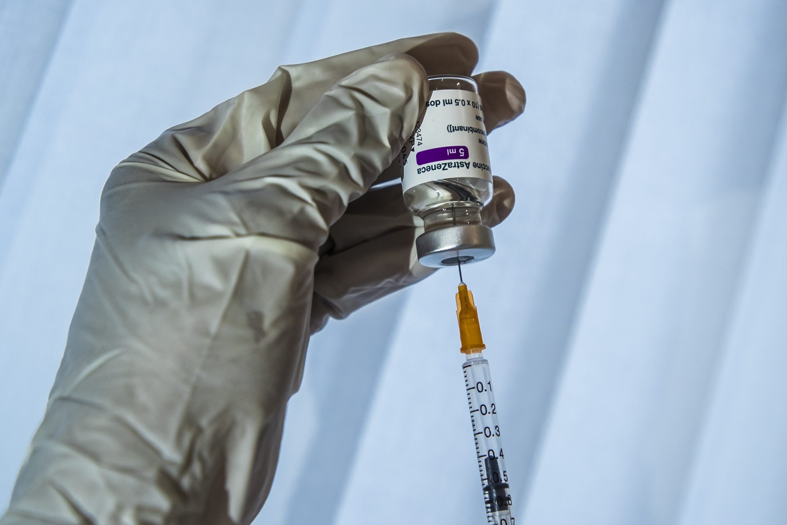 epa09038092 A doctor prepares his syringe with a dose of Oxford Astra-Zeneca COVID-19 vaccine  before a first vaccine injection in Paris, France, 26 February, 2021. France begins vaccination of people aged 50 to 64 with Astrazeneca anti-covid19 vaccine as allowing doctors to vaccinate in their doctor's offices as the country is in the midst of a new wave of coronavirus (COVID-19) infections as the number of cases is increasing day by day.  EPA/CHRISTOPHE PETIT TESSON