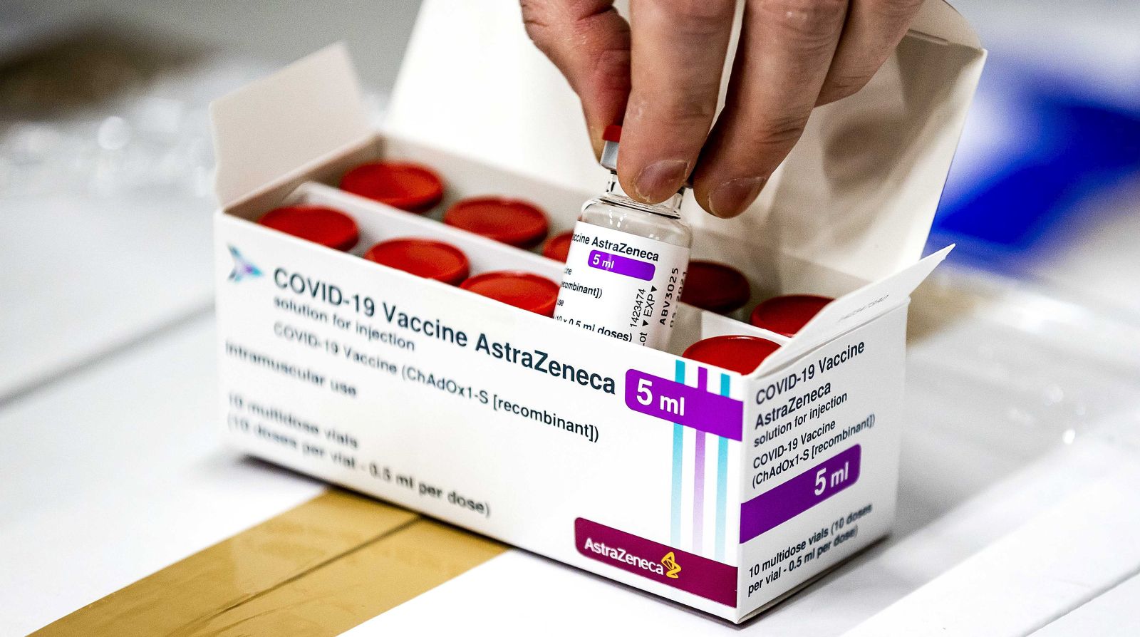 epa09074881 (FILE) - A vial of AstraZeneca's Covid-19 vaccine stored in Movianto in Oss, The Netherlands, 12 February 2021 (reissued 14 March 2021). The Dutch health ministry on 14 March 2021 said it was suspending the AstraZeneca vaccine rollout, just days after pressing ahead with its use.  EPA/Remko de Waal