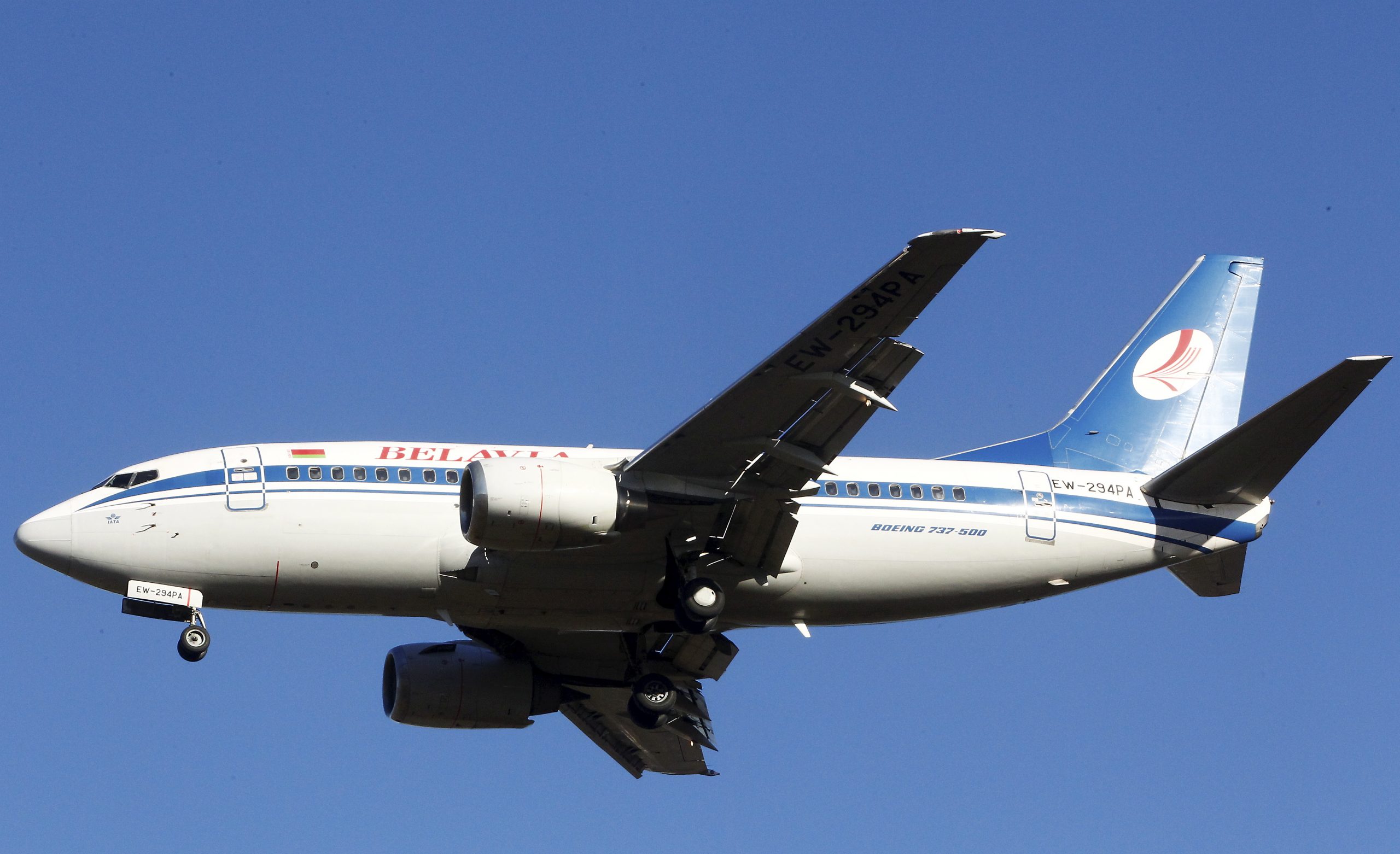 epa09225898 (FILE) belarusian Airlines Belavia Boeing 737 - 505 is landing at Riga International Airport, Latvia, 23 March 2018 (reissued 24 May 2021). During a special EU Summit on 24 May, European Union leaders decided to ban Belarusian airlines from flying in EU airspace and prevent them access EU airports. The EU Council decided on several sanctions against Belarus after Belarus' opposition journalist Roman Protasevich was detained by Belarusian Police on 23 May on a Ryanair flight from Athens to Vilnius, that was forced to land in Minsk.  EPA/TOMS KALNINS *** Local Caption *** 54219592