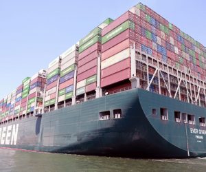 epa09328294 The container ship 'Ever Given' moves in the Suez Canal, Egypt, 07 July 2021. The Ever Given ran aground in the Suez Canal on 23 March, causing a huge traffic backlog of ships. The container ship that blocked the Suez Canal for almost a week has been detained with its crew in a lake between two stretches of the waterway since it was dislodged on 29 March. The Suez Canal Authority has previously announced that the ship will be allowed to sail on 07 July after a multimillion-dollar compensation deal was reached with the owner.  EPA/KHALED ELFIQI