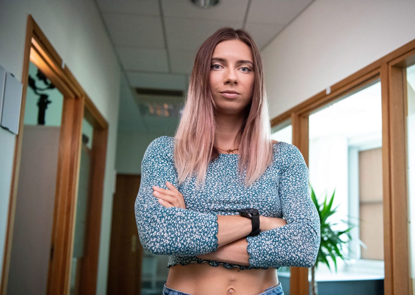 epa09407114 Belarusian sprinter Krystsina Tsimanouskaya poses for a photo during an interview with the Polish Press Agency in Warsaw, Poland, 07 August 2021 (issued 09 August 2021). Defected Belarusian Olympic sprinter Krystsina Tsimanouskaya landed 04 August in Warsaw  on a flight from Vienna, where she arrived from the Olympic Games in Tokyo. Tsimanouskaya, who refused to board a plane to Belarus in Tokyo after being expelled from the Belarusian Olympic squad for critical remarks about a coach, was admitted to the Polish embassy in Tokyo. Poland's prime minister Mateusz Morawiecki said Tsimanouskaya could count on "support and solidarity from Poland". Tsimanouskaya and her husband have been granted Polish humanitarian visas.  EPA/Andrzej Lange POLAND OUT