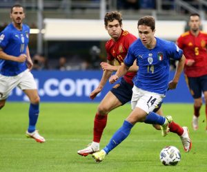 epa09509721 Federico Chiesa (R) of Italy in action against Marcos Alonso of Spain during the UEFA Nations League semi final soccer match between Italy and Spain in Milan, Italy, 06 October 2021.  EPA/MATTEO BAZZI