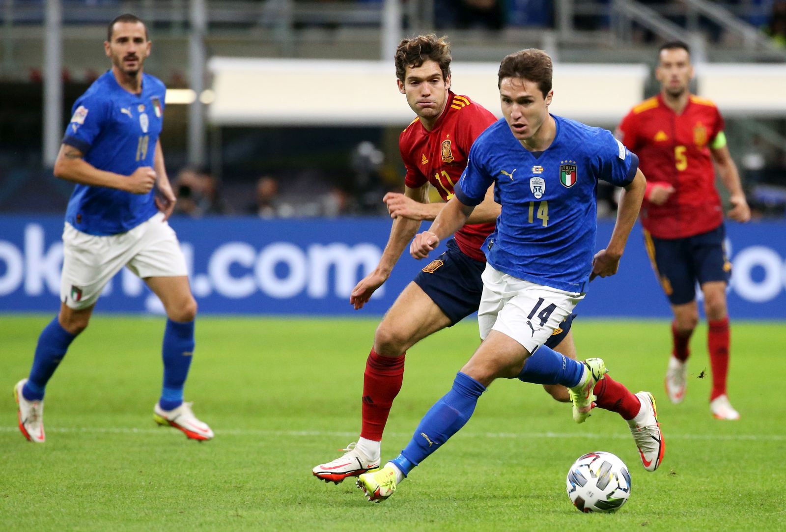 epa09509721 Federico Chiesa (R) of Italy in action against Marcos Alonso of Spain during the UEFA Nations League semi final soccer match between Italy and Spain in Milan, Italy, 06 October 2021.  EPA/MATTEO BAZZI