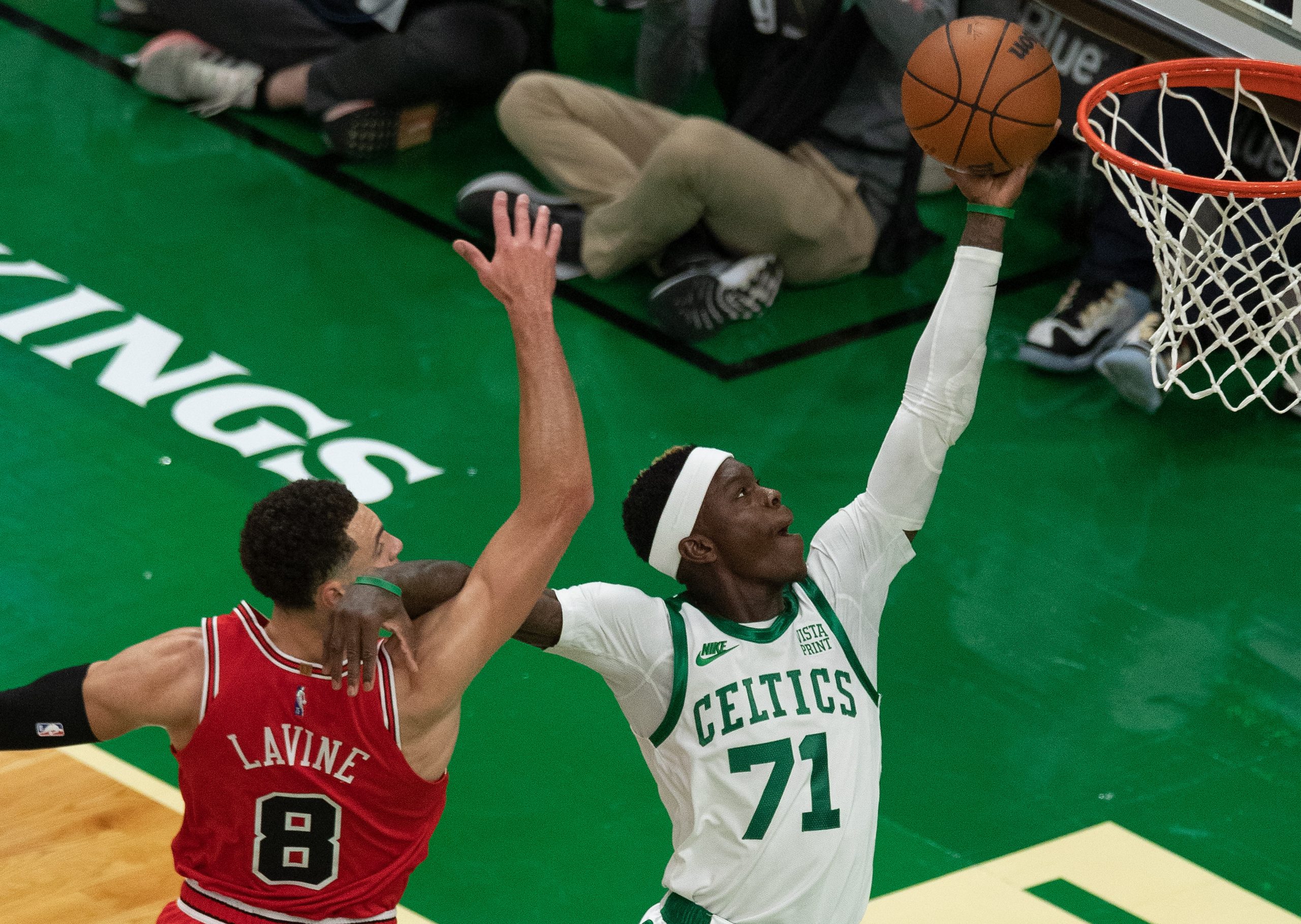 epa09558499 Boston Celtics guard Dennis Schroder (R) is fouled by Chicago Bulls guard Zach LaVine (L) during the first quarter at the TD Garden in Boston, Massachusetts, USA, 01 November 2021.  EPA/CJ GUNTHER  SHUTTERSTOCK OUT