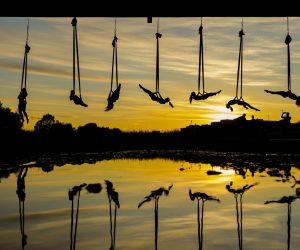 11.06.2020., Zagreb - Viseci s mosta Mladosti, clanice Triko Cirkus Studia izvode ples Aerial hammocka tijekom zalaska sunca.
Photo: Borna Filic/PIXSELL