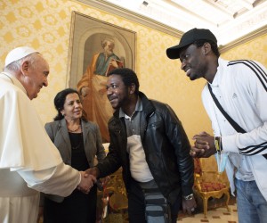 epa09647014 A handout picture provided by the Vatican Media shows Pope Francis (L) meets a group of refugees, hosted by the Community of Sant'Egidio, at the Vaican City, 17 December 2021.  EPA/VATICAN MEDIA HANDOUT  HANDOUT EDITORIAL USE ONLY/NO SALES