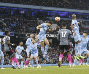 epa09657290 Manchester City's Aymeric Laporte (C) in action during the English Premier League match between Manchester City and Leicester City in Manchester, Britain, 26 December 2021.  EPA/MAGI HAROUN EDITORIAL USE ONLY. No use with unauthorized audio, video, data, fixture lists, club/league logos or 'live' services. Online in-match use limited to 120 images, no video emulation. No use in betting, games or single club/league/player publications