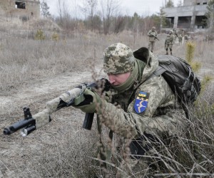 epa09772048 Reservists of the Ukrainian Territorial Defence attend a military exercise near Kiev, Ukraine, 19 February 2022, amid escalation on the Ukraine-Russian border. According to a survey conducted by the Kiev International Institute of Sociology (KIIS) from December 2021, 50.2 percent of Ukrainians said they would resist in case of a Russian military intervention into their city, town or village. Every third respondent to the poll said they were ready to engage in armed resistance, and 21.7 percent said they were ready to participate in civil resistance actions.  EPA/SERGEY DOLZHENKO