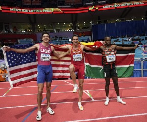 Bronze medalist Bryce Hoppel, of the United States, gold medalist Mariano Garcia, of Spain, and silver medalist Noah Kibet, of Kenya,, from left to right, pose after the Men's 800 meters at the World Athletics Indoor Championships in Belgrade, Serbia, Saturday, March 19, 2022. (AP Photo/Darko Vojinovic)