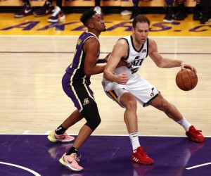 epa09764417 Utah Jazz forward Bojan Bogdanovic (R) in action against Los Angeles Lakers guard Malik Monk (L) during the first quarter of the NBA game between the Los Angeles Lakers and the Utah Jazz at the Crypto.com Arena in Los Angeles, California, USA, 16 February 2022.  EPA/ETIENNE LAURENT  SHUTTERSTOCK OUT