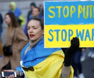 epa09805360 People attend a protest march named 'Stand with Ukraine' against the Russian invasion of Ukraine, in Brussels, Belgium, 06 March 2022. People all over the world hold vigils and demonstrations for peace in the Ukraine and against Russian troops invading the country. Russian troops entered Ukraine on 24 February prompting the country's president to declare martial law and triggering a series of severe economic sanctions imposed by Western countries on Russia.  EPA/STEPHANIE LECOCQ