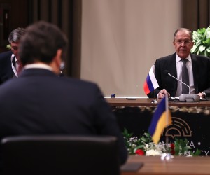 epa09814228 A handout photo made available by the press service of the Turkish Foreign Affairs Ministry shows Russian Foreign Minister Sergei Lavrov (R) and Ukranian Foreign Minister Dmytro Kuleba (front) posing before their meeting during the Antalya Diplomacy Forum in Antalya, Turkey, 10 March 2022. Russian and Ukrainian Foreign Ministers meet for diplomatic talks during the Russian 'special military operation' in Ukraine. Russian troops entered Ukraine on 24 February prompting the country's president to declare martial law and triggering a series of severe economic sanctions imposed by Western countries on Russia.  EPA/CEM OZDEL / Turkish Foreign Affairs Ministry HANDOUT  HANDOUT EDITORIAL USE ONLY/NO SALES