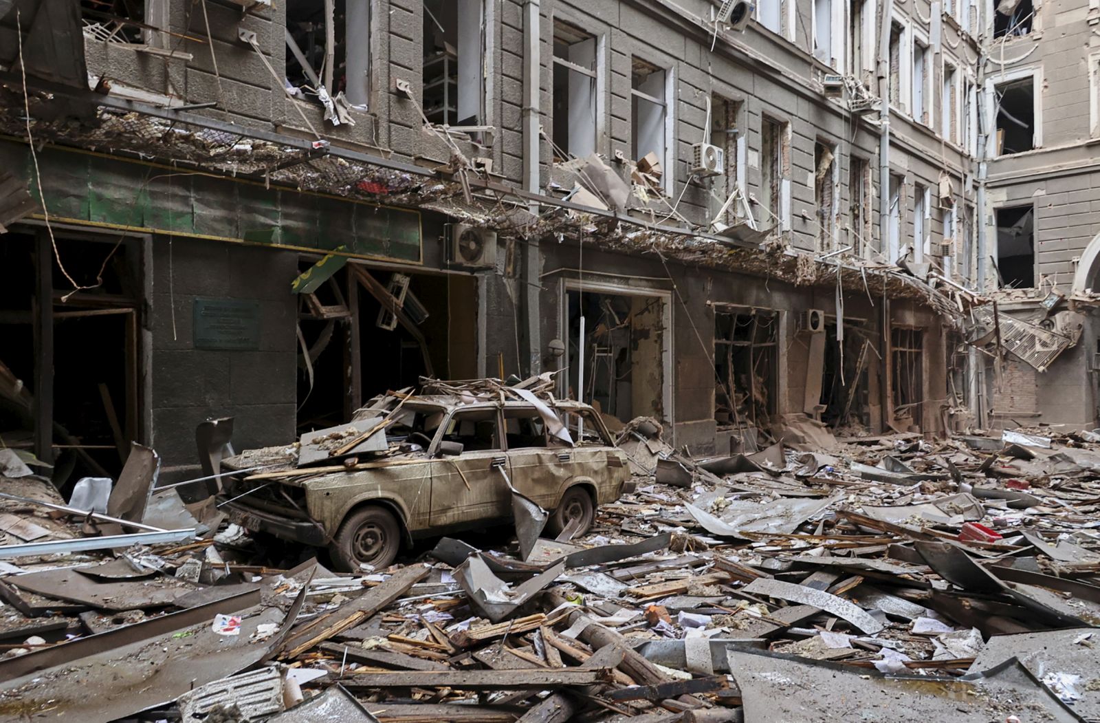 epa09840193 (FILE) - General view of damage after the shelling of buildings in downtown Kharkiv, Ukraine, 03 March 2022 (reissued 21 March 2022). Russian troops entered Ukraine on 24 February prompting the country's president to declare martial law. Since Russia invaded Ukraine one month ago on 24 February 2022, more than three million Ukrainians became refugees, around 700 civilians were killed and over 1.000 more injured, the United Nations said.  EPA/SERGEY KOZLOV  ATTENTION: This Image is part of a PHOTO SET