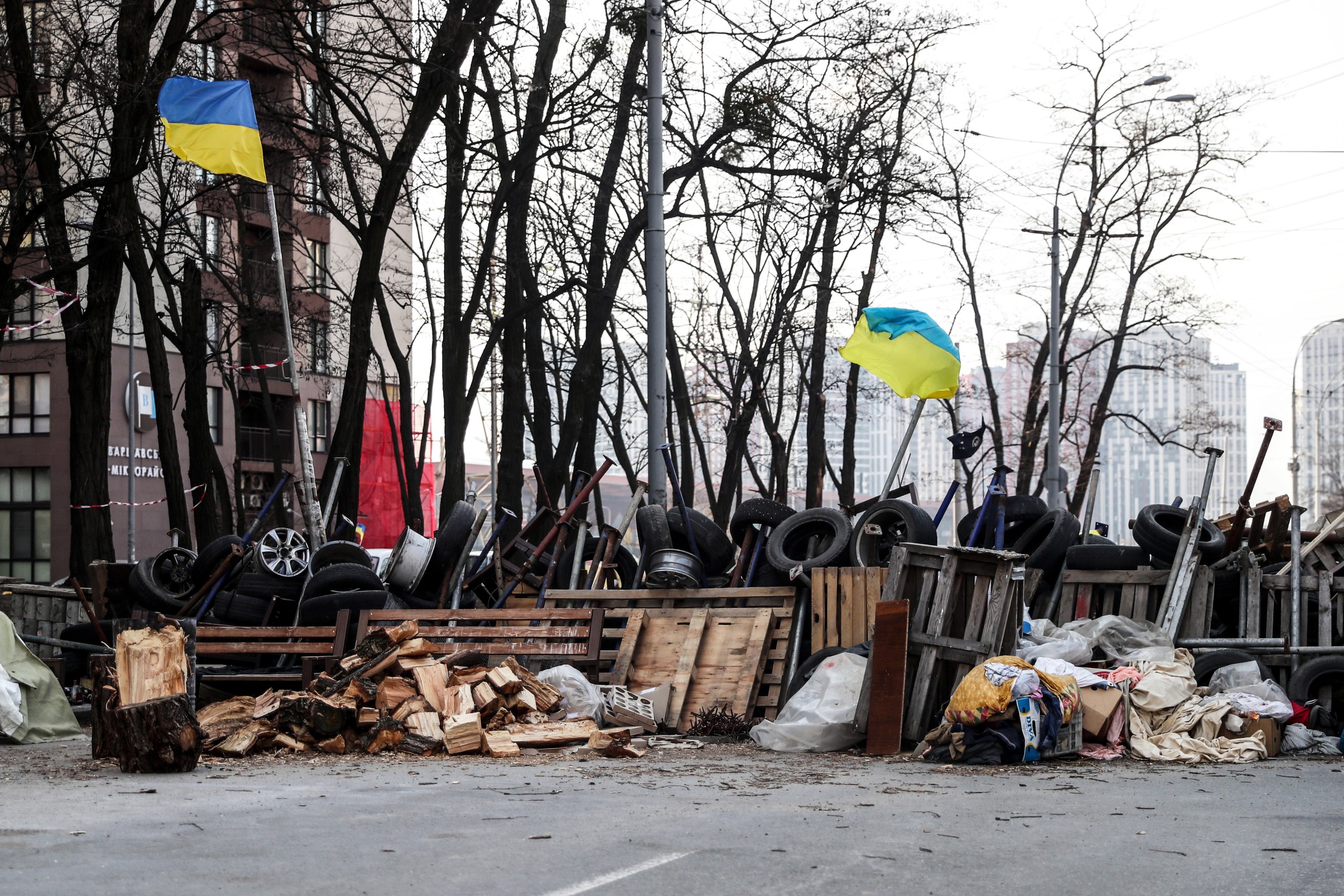 epa09847117 A barricade made with all kinds of rustic materials in a street in Kyiv (Kiev), Ukraine, 24 March 2022, after a month of war. On 24 February Russian troops had entered Ukrainian territory in what the Russian president declared a 'special military operation', resulting in fighting and destruction in the country, a huge flow of refugees, and multiple sanctions against Russia.  EPA/NUNO VEIGA