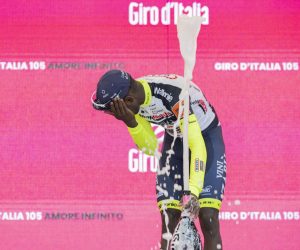 epaselect epa09953249 Eritrean rider Biniam Girmay  of Team Intermarche-Wanty-Gobert Materiaux celebrates on the podium after winning the 10th stage of the Giro d'Italia 2022 cycling race, over 196km between Pescara and Jesi, central Italy, 17 May 2022.  EPA/MAURIZIO BRAMBATTI