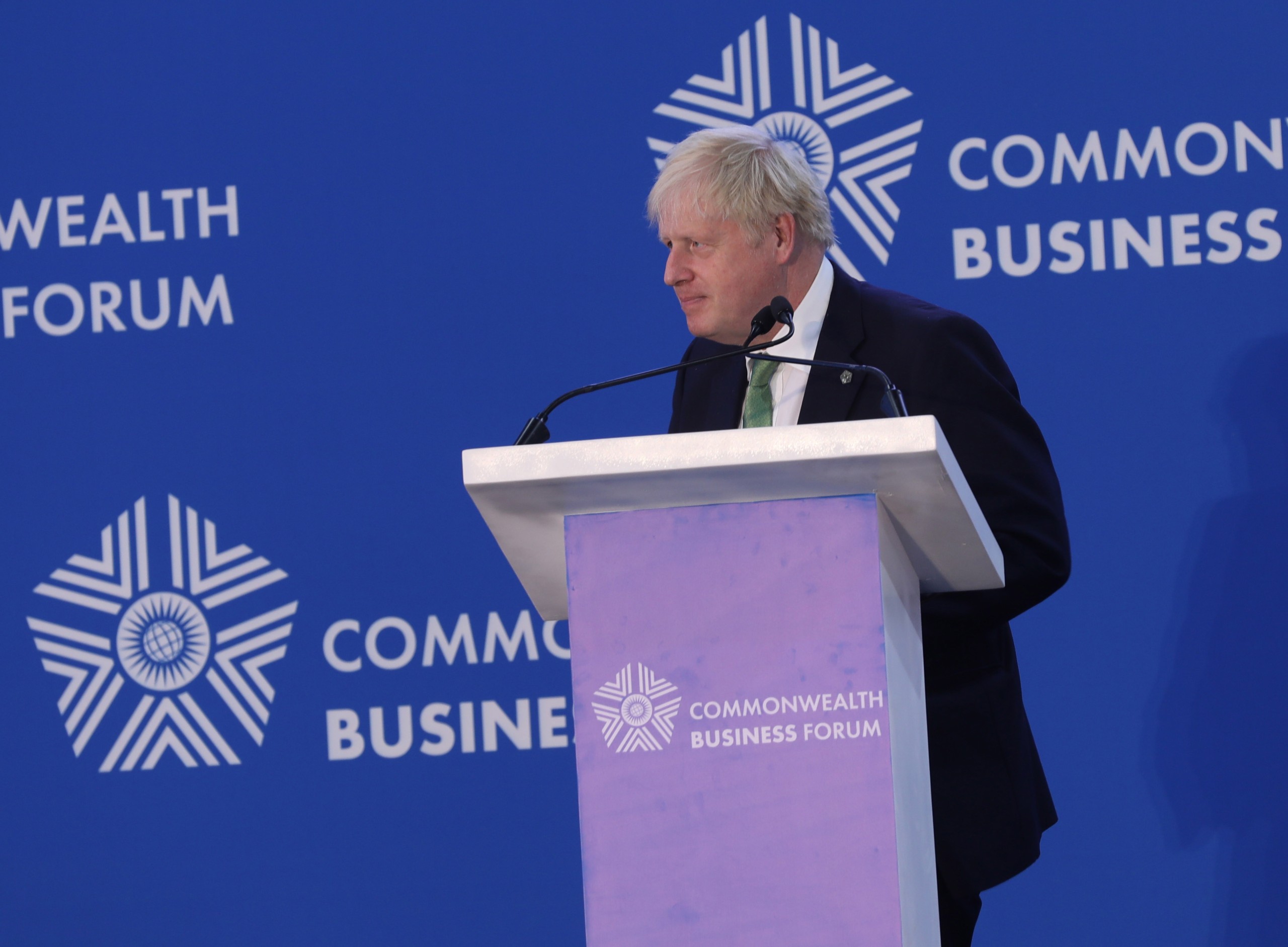 epa10030272 British Prime Minister Boris Johnson delivers a speech during a business forum of the Commonwealth Heads of Government Meeting (CHOGM) in Kigali, Rwanda, 23 June 2022. Rwanda is hosting the CHOGM Summit from 20 to 25 June.  EPA/EUGENE UWIMANA