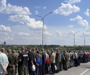 epa10042215 A handout picture made available by the press service of the Defense Intelligence of the Ministry of Defense of Ukraine, shows Ukrainian prisoners of war who were released as part of a prisoner swap with Russia, walking towards the Ukrainian side at an undisclosed location, Ukraine, 29 June 2022. The 144 Ukrainian soldiers were released from Russian captivity, 95 of them were part of the Azovstal (Mariupol) fighters. According to a statement by the Ukrainian Presidential Office on 06 June quoting President Zelensky, there may be more than 2,500 prisoners from the Azovstal plant being held captive by Russian forces.  EPA/Defense Intelligence Ministry of Defense of Ukraine HANDOUT EDITORIAL USE ONLY NO SALES HANDOUT EDITORIAL USE ONLY/NO SALES