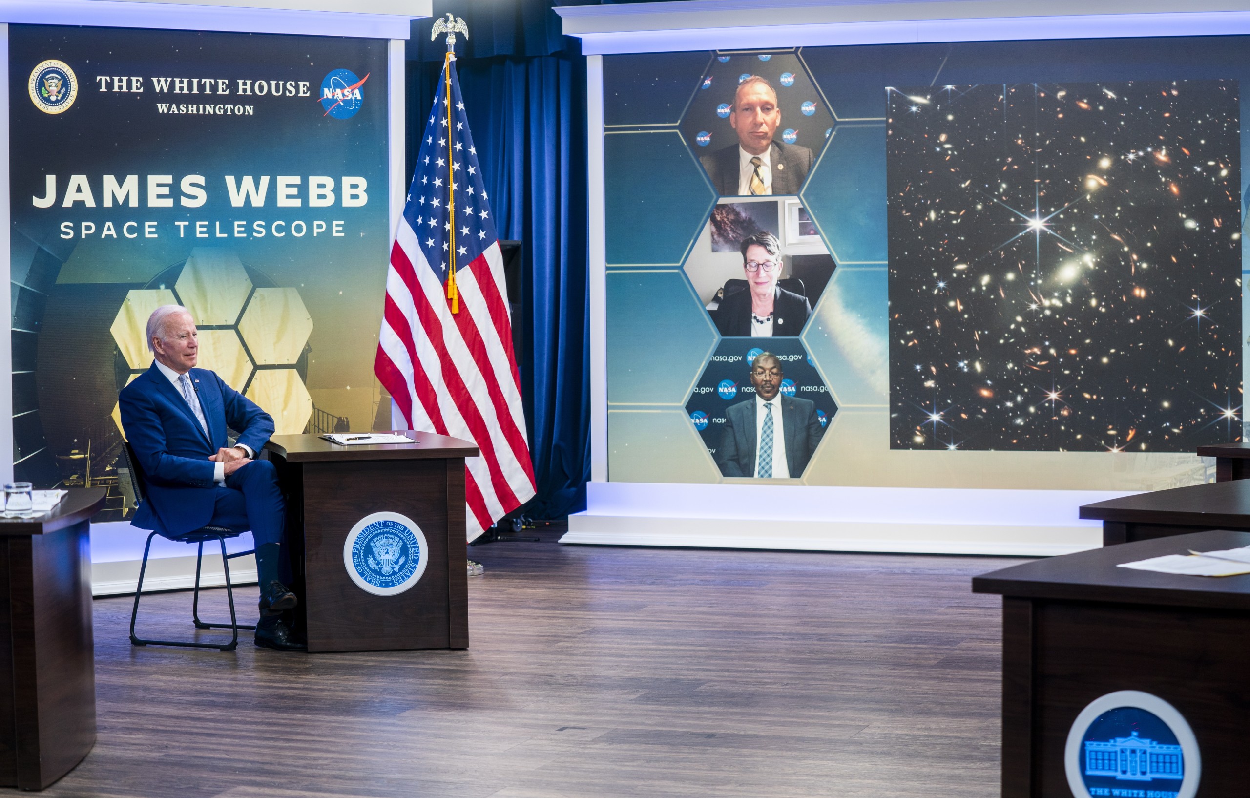 epa10065878 US President Joe Biden looks on during a briefing from National Aeronautics and Space Administration (NASA) officials about the first images from the Webb Space Telescope in the South Court Auditorium of the White House in Washington, DC, USA 11 July 2022.  EPA/SHAWN THEW