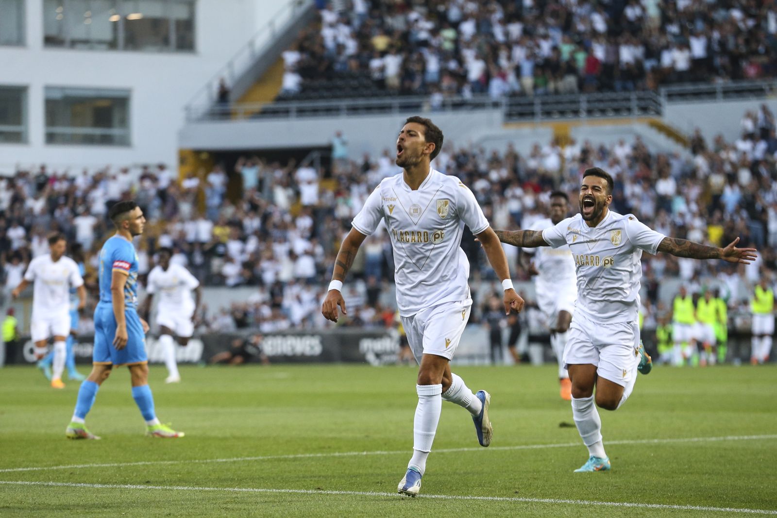 epa10085166 Vitoria de Guimaraes Ruben Lameiras celebrates after scoring a goal against Puskas Akademia during their UEFA Europa Conference League qualification soccer match, held at D. Afonso Henriques stadium, in Guimaraes, Portugal, 21 July 2022.  EPA/JOSE COELHO